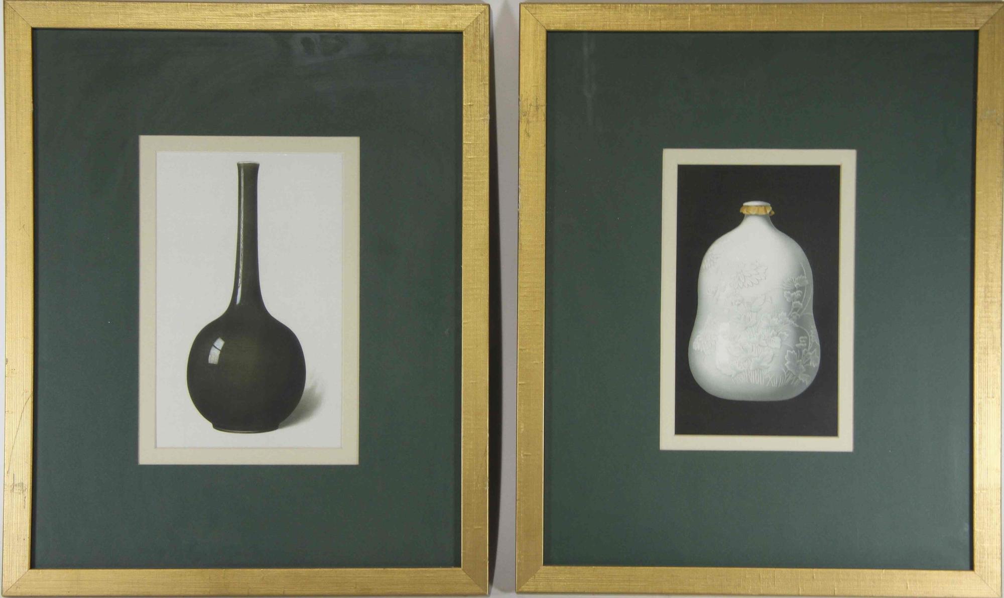 A Group of Four Ceramic Plates Height of tallest 22 1/2 inches.