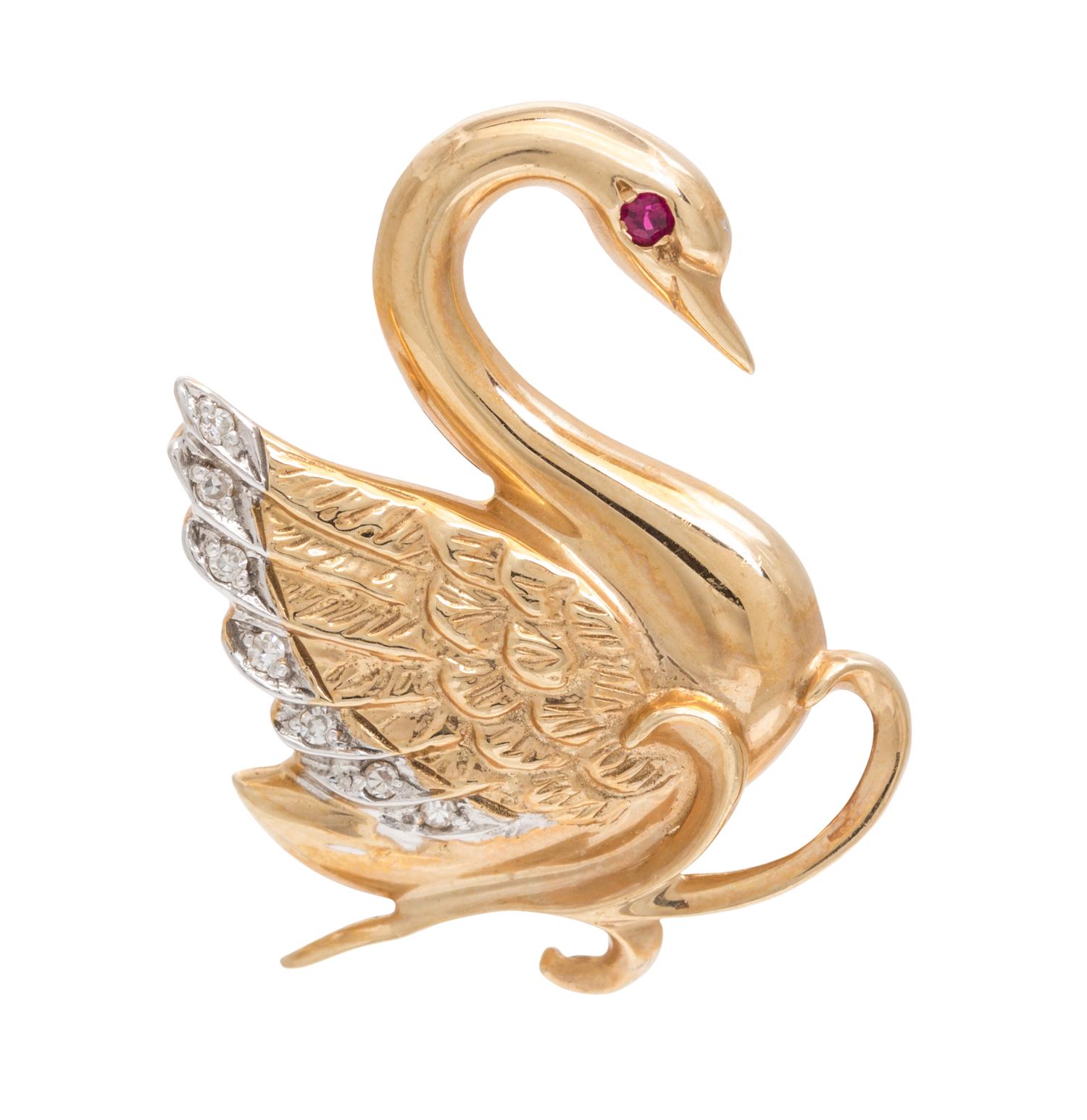 A Collection of 14 Karat Yellow Gold, Ruby and Diamond Brooches, 7.50 dwts.
