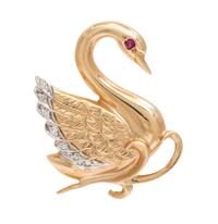 A Collection of 14 Karat Yellow Gold, Ruby and Diamond Brooches, 7.50 dwts.