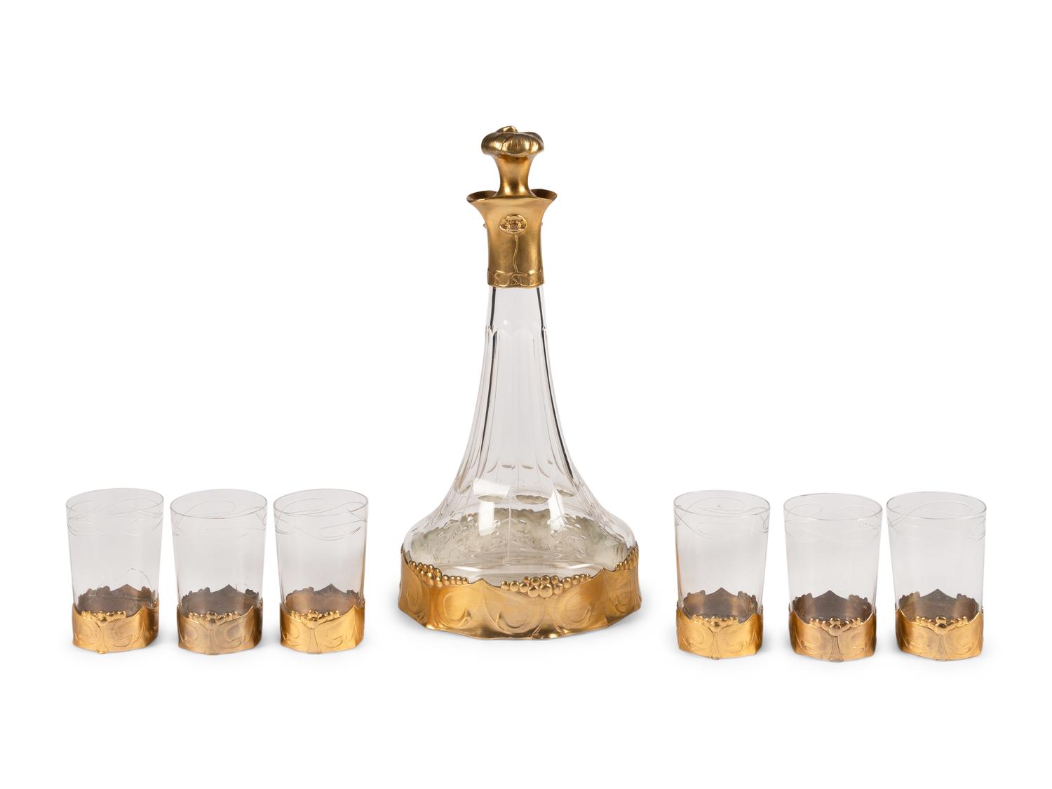 An Art Nouveau Gilt Pewter Mounted Glass Osiris Drink Service by Friedrich Adler (1878-1942)