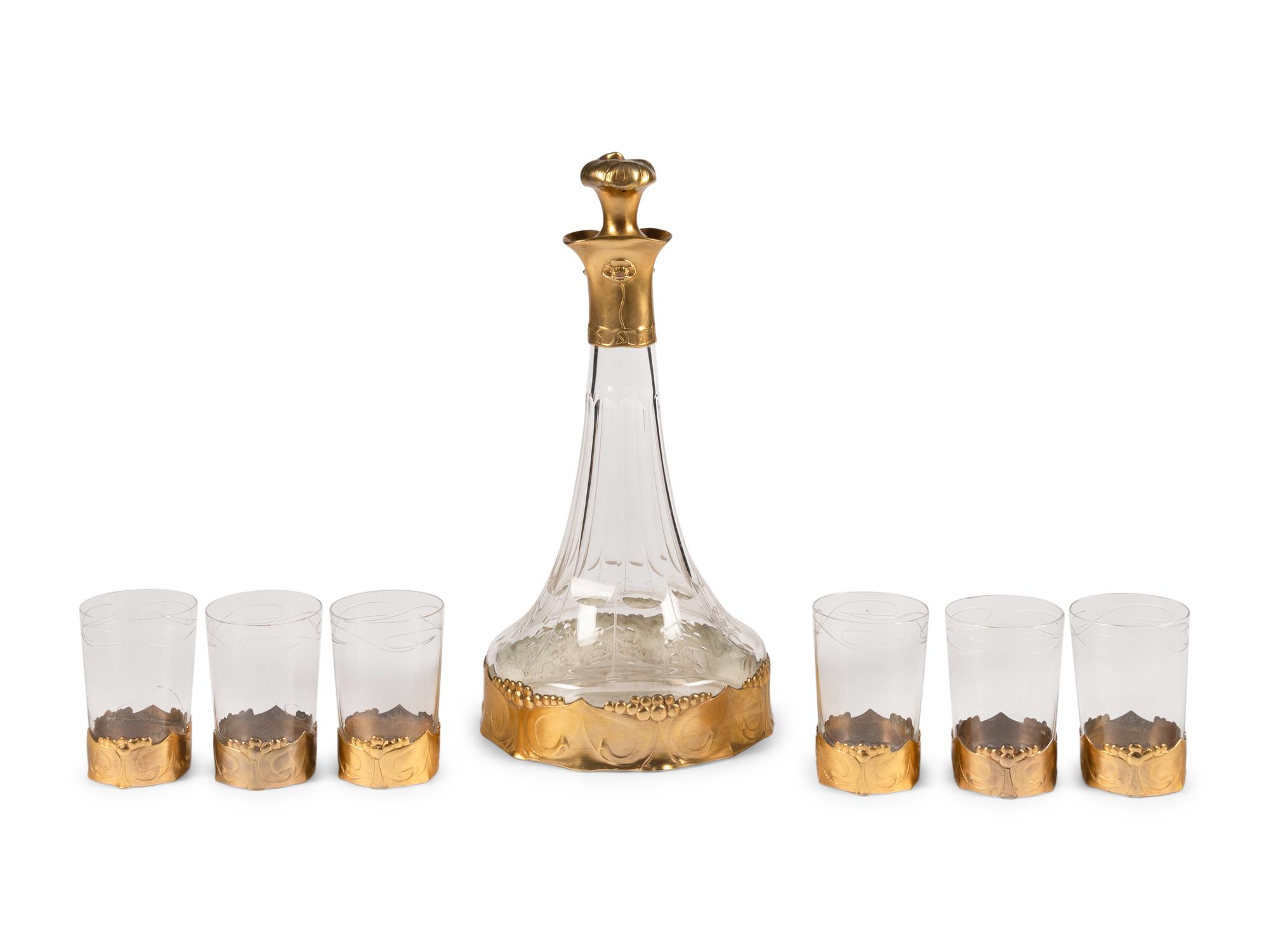 An Art Nouveau Gilt Pewter Mounted Glass Osiris Drink Service by Friedrich Adler (1878-1942)
