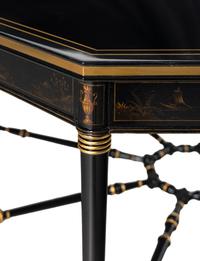 A Regency Style Ebonized and Parcel Gilt Center Table