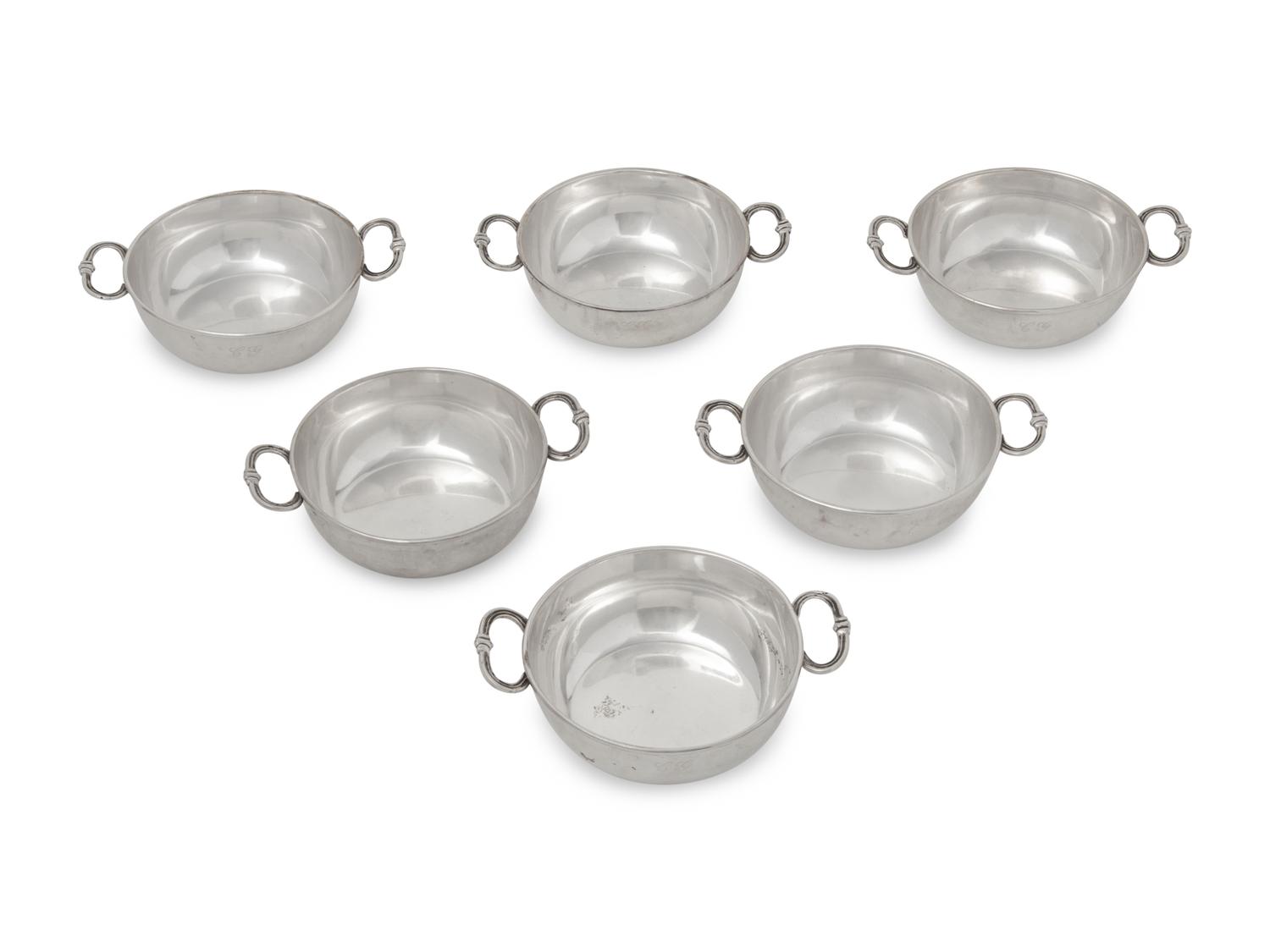 A Set of Six Silver Bowls with Handles