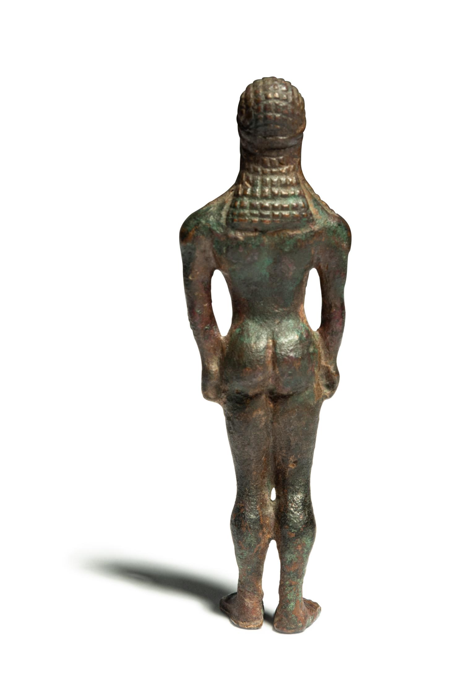 A Greek Bronze Kouros