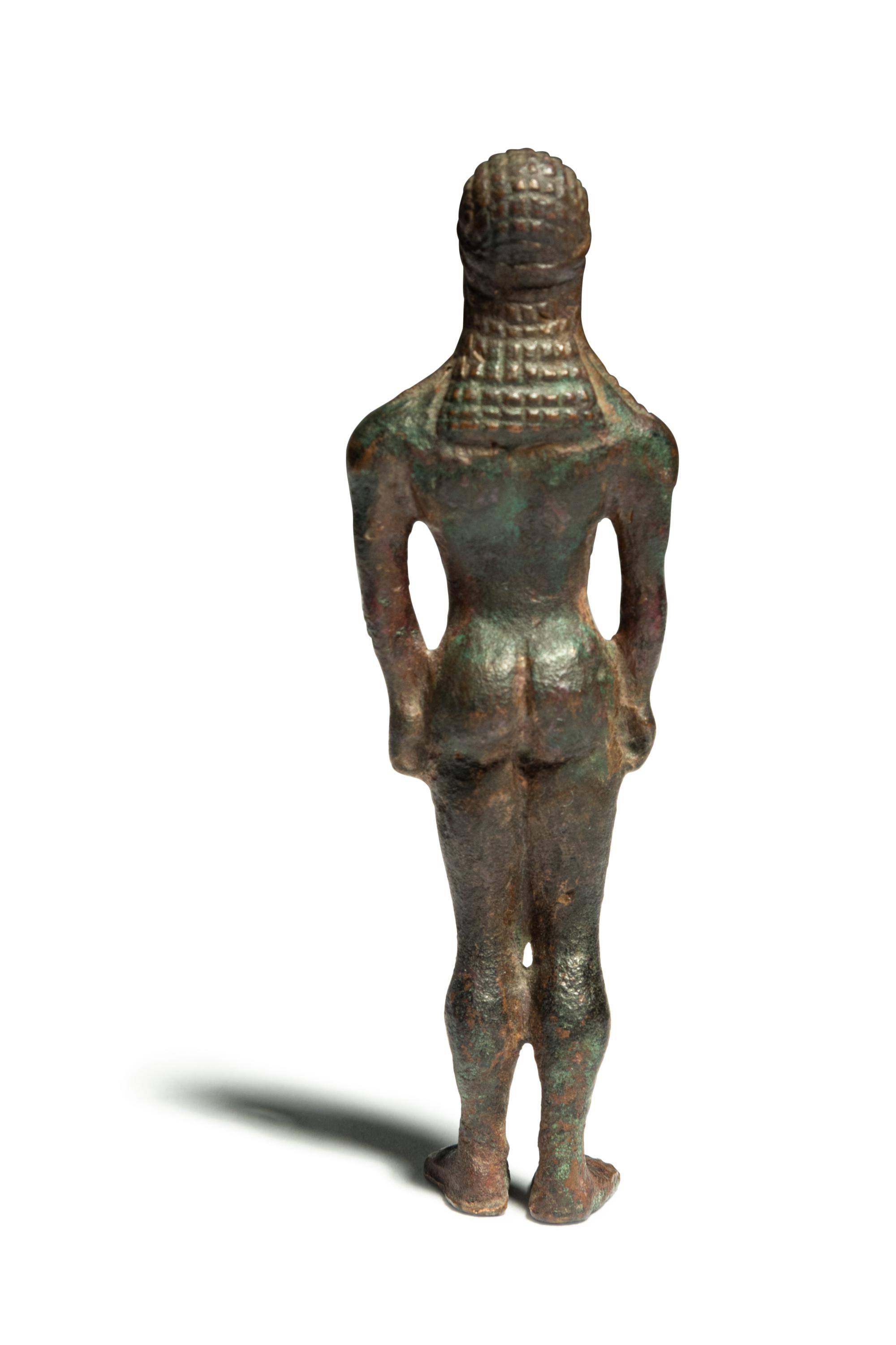 A Greek Bronze Kouros