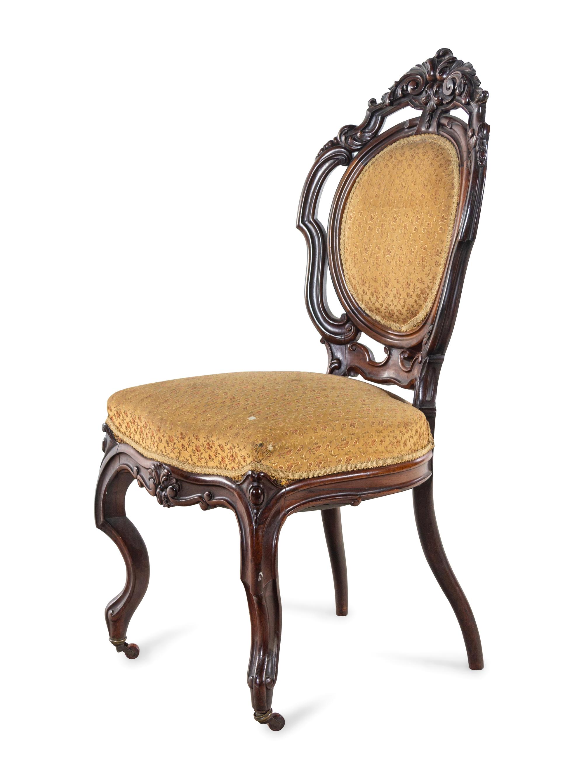 A Victorian Carved Mahogany Side Chair