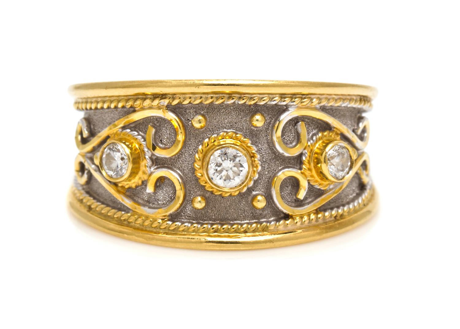 An 18 Karat Gold and Diamond Ring, Gikas, 6.10 dwts.