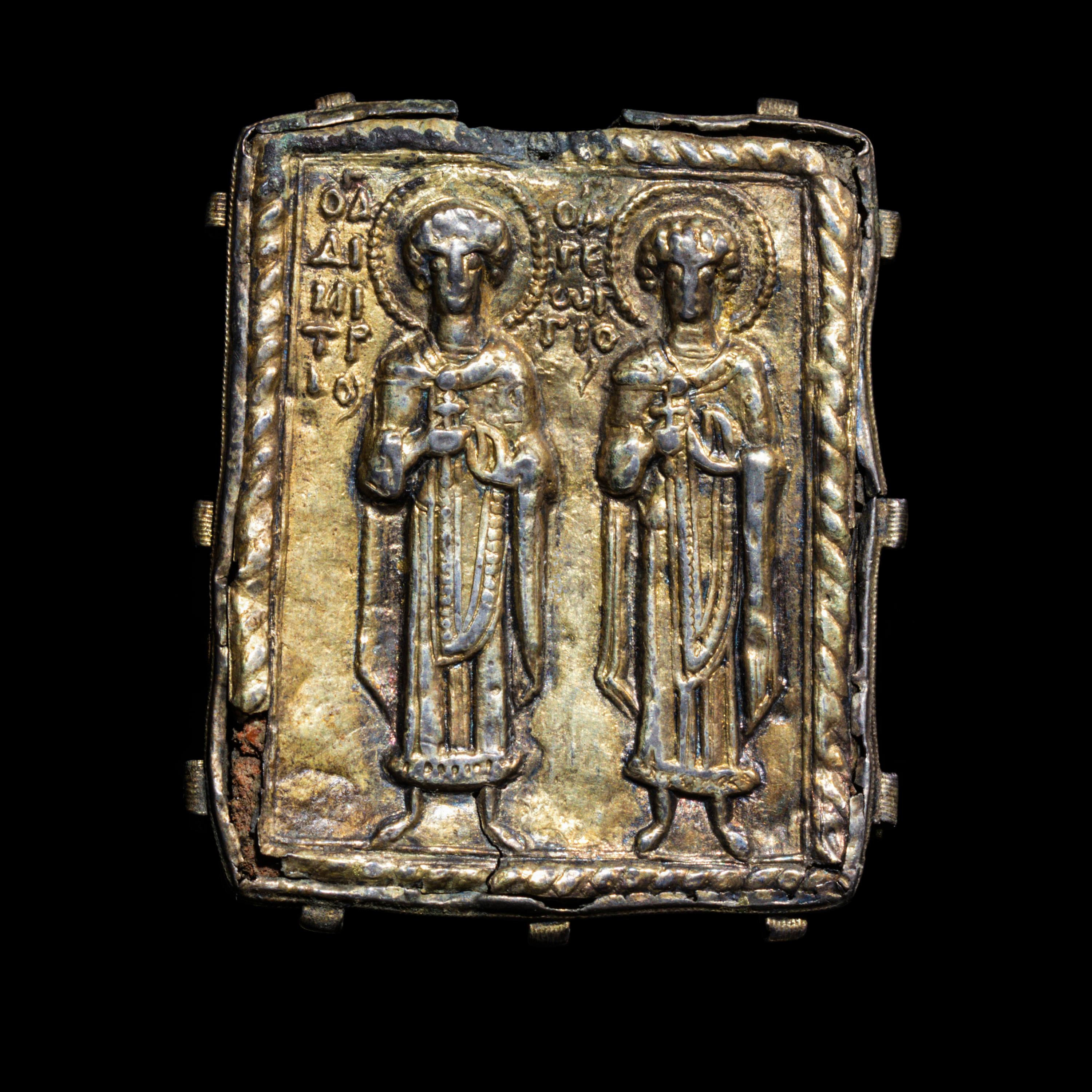 A Byzantine Gilt-Silver Enkolpion with Saints Demetrios and George