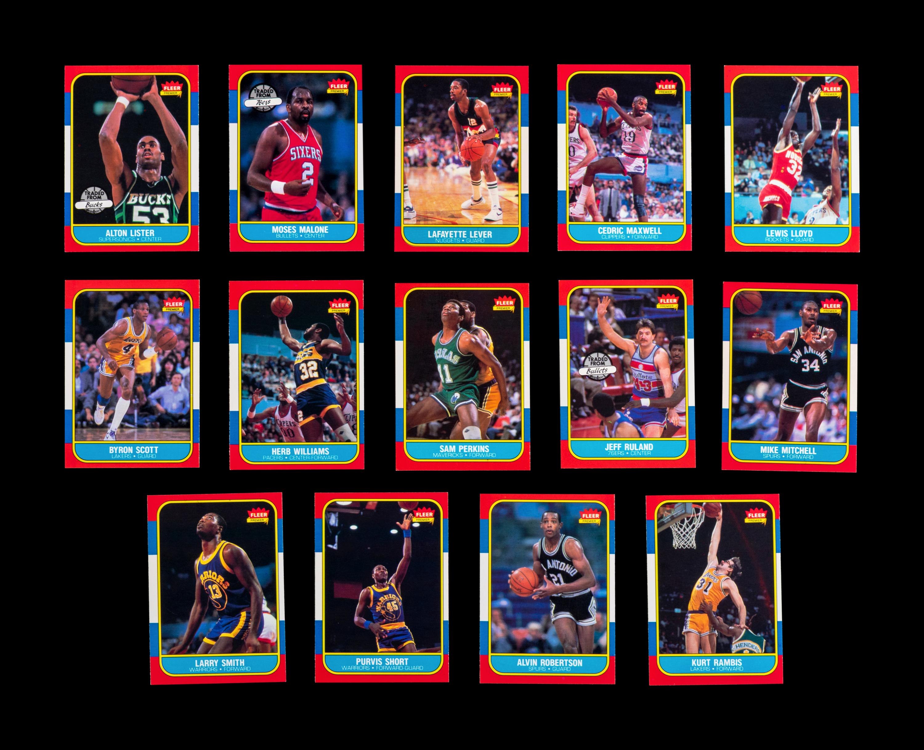 A Group of 54 1986 Fleer Basketball Cards, Including a Patrick Ewing Rookie No. 32, and Two Stickers