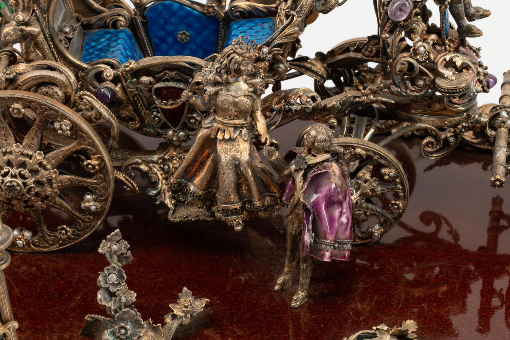A Continental Jeweled Silver and Enamel Model of a Horse-Drawn Coach — CIRCA 1900