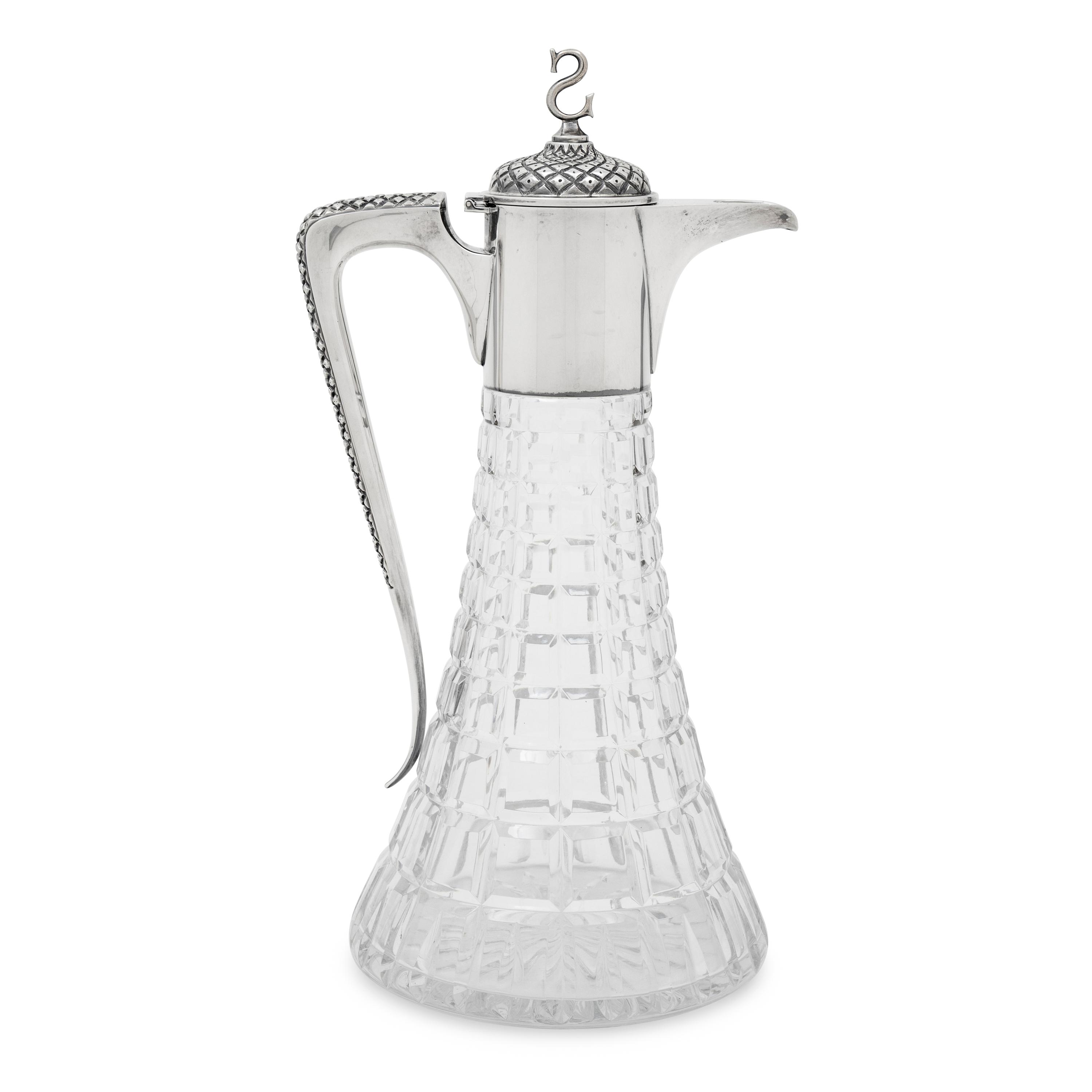 An English Silver Mounted Cut Glass Claret Jug