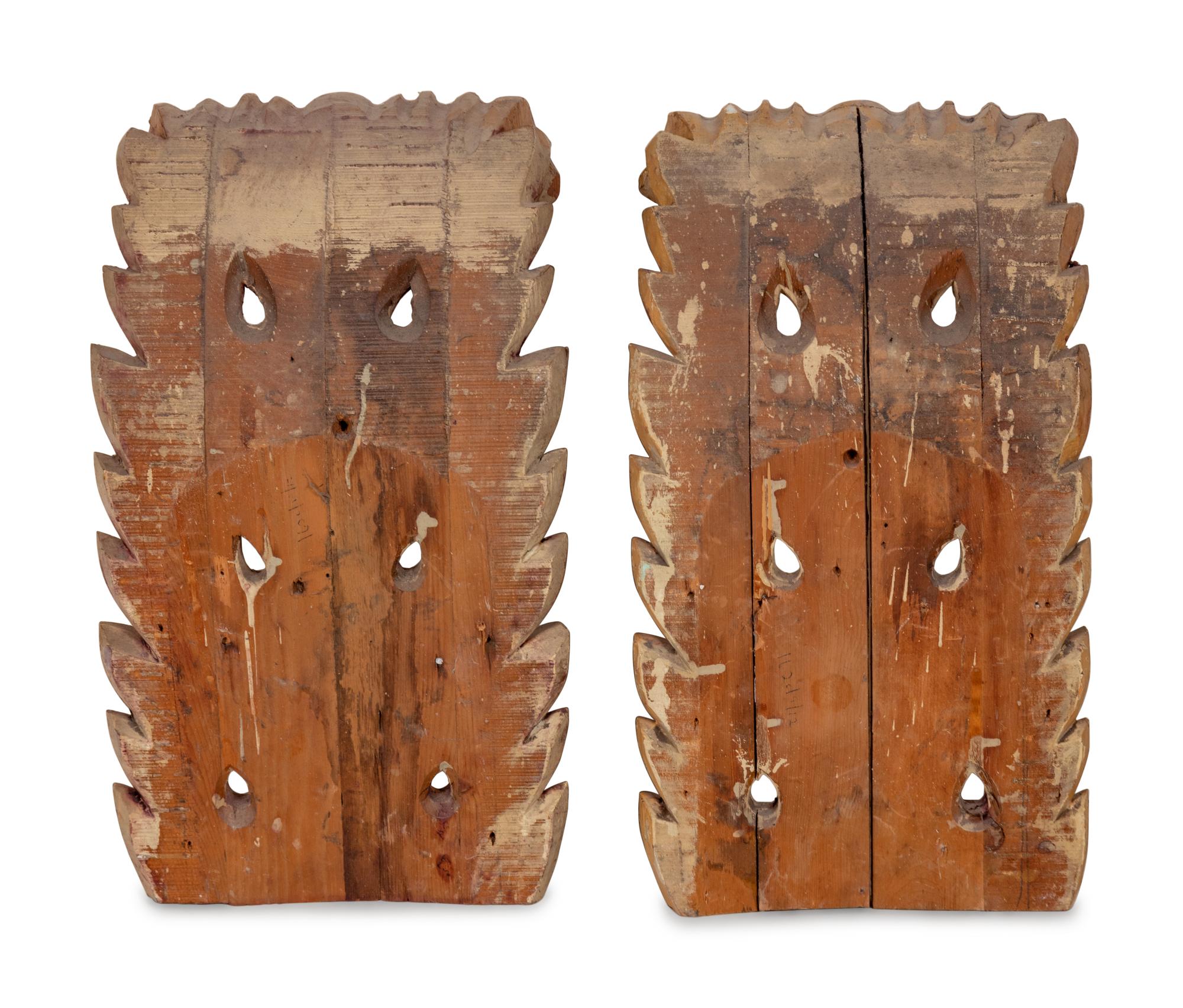 A Pair of Continental Painted and Giltwood Brackets
