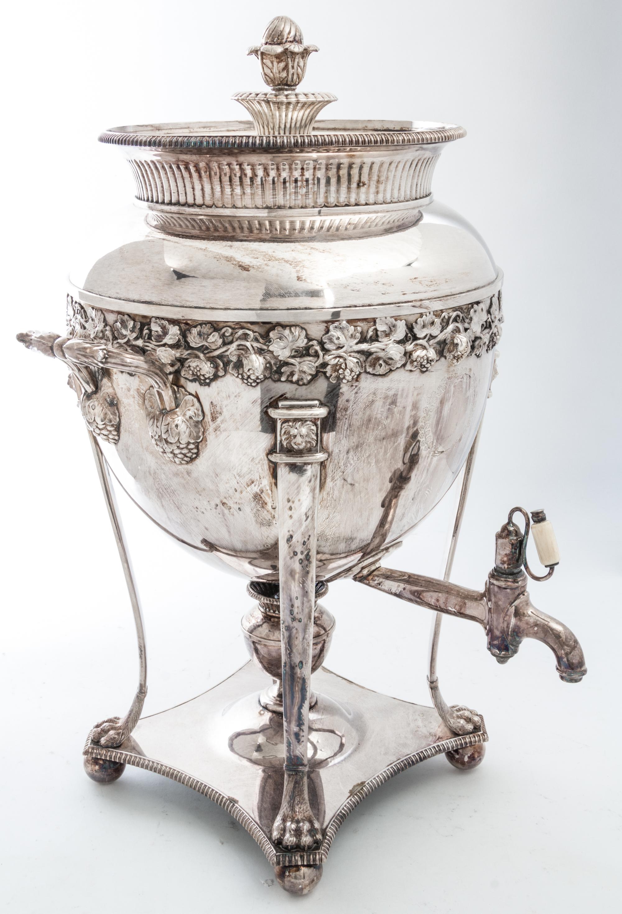 An English Silver-Plate Tea Urn Height 18 3/4 inches.