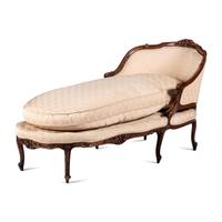 A Louis XV Style Carved Walnut Chaise Lounge