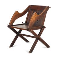 A Gothic Revival Oak Folding Chair