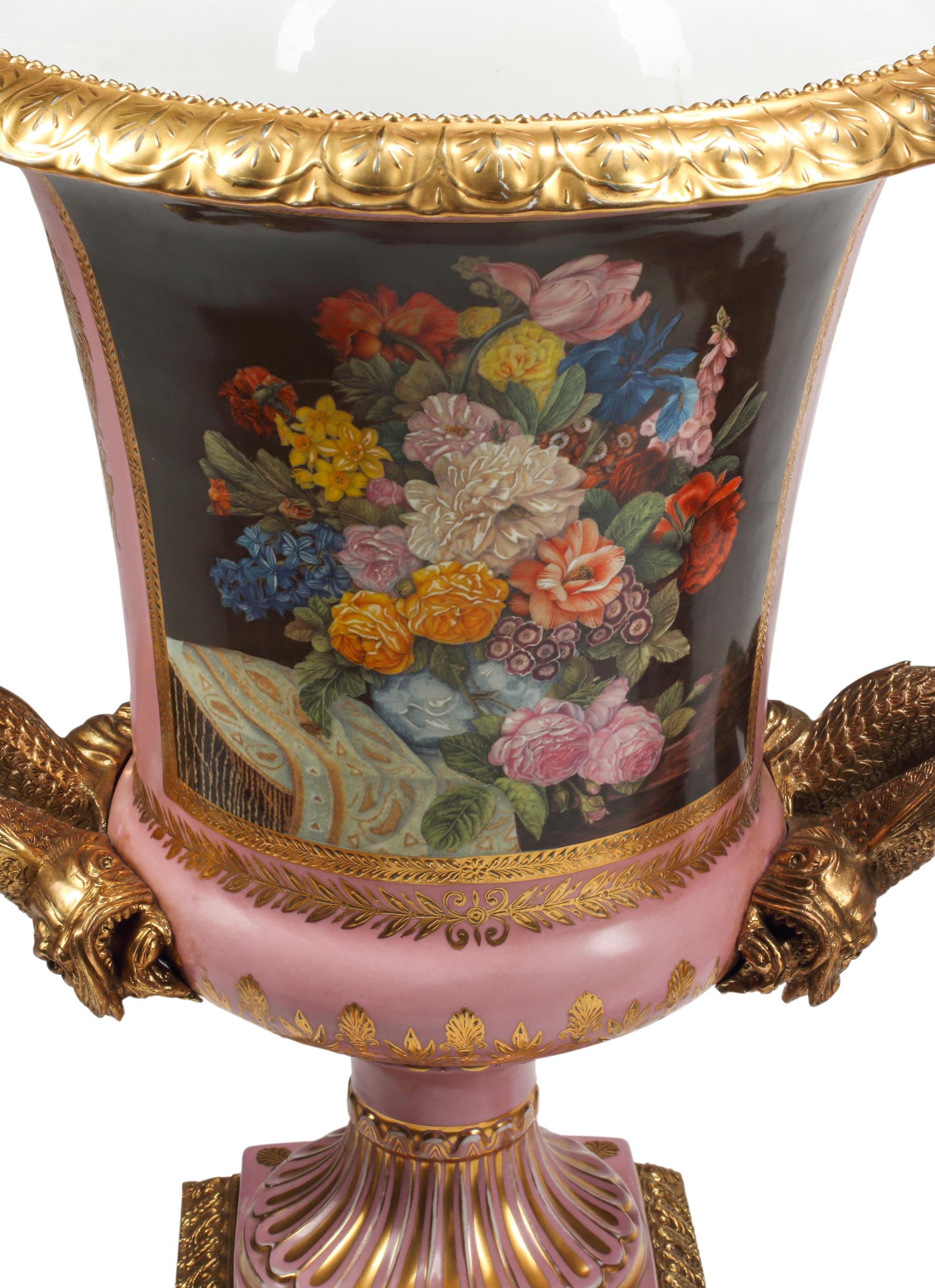 A Pair of Large Sèvres Style Porcelain and Gilt Bronze Mounted Urns