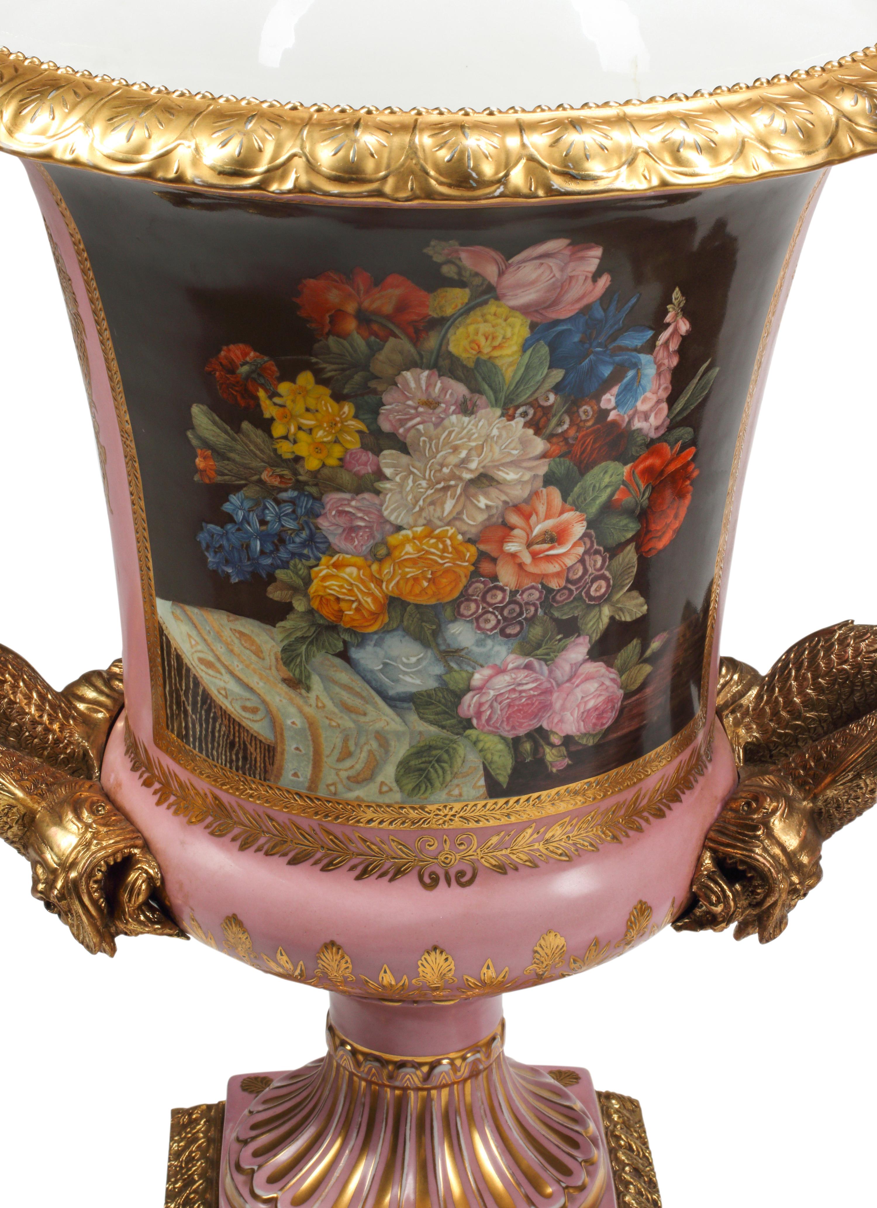 A Pair of Large Sèvres Style Porcelain and Gilt Bronze Mounted Urns