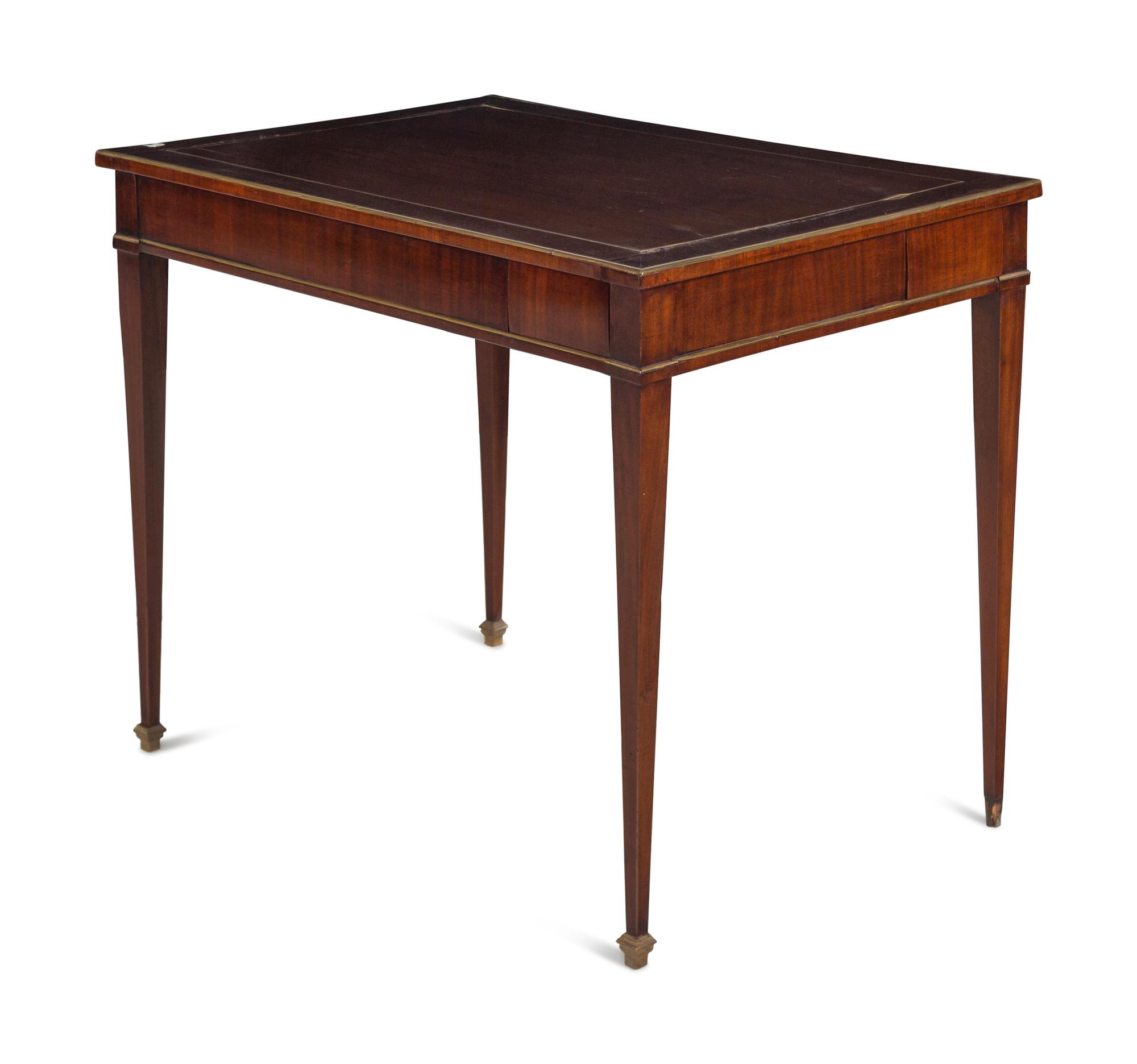 A Russian or Baltic Neoclassical Brass Mounted Mahogany Four-Drawer Table
