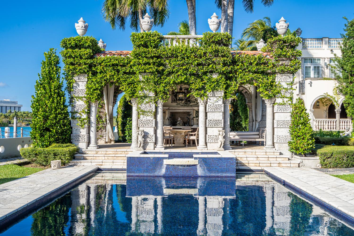 A Louis XVI Style Painted and Parcel Gilt Side Table