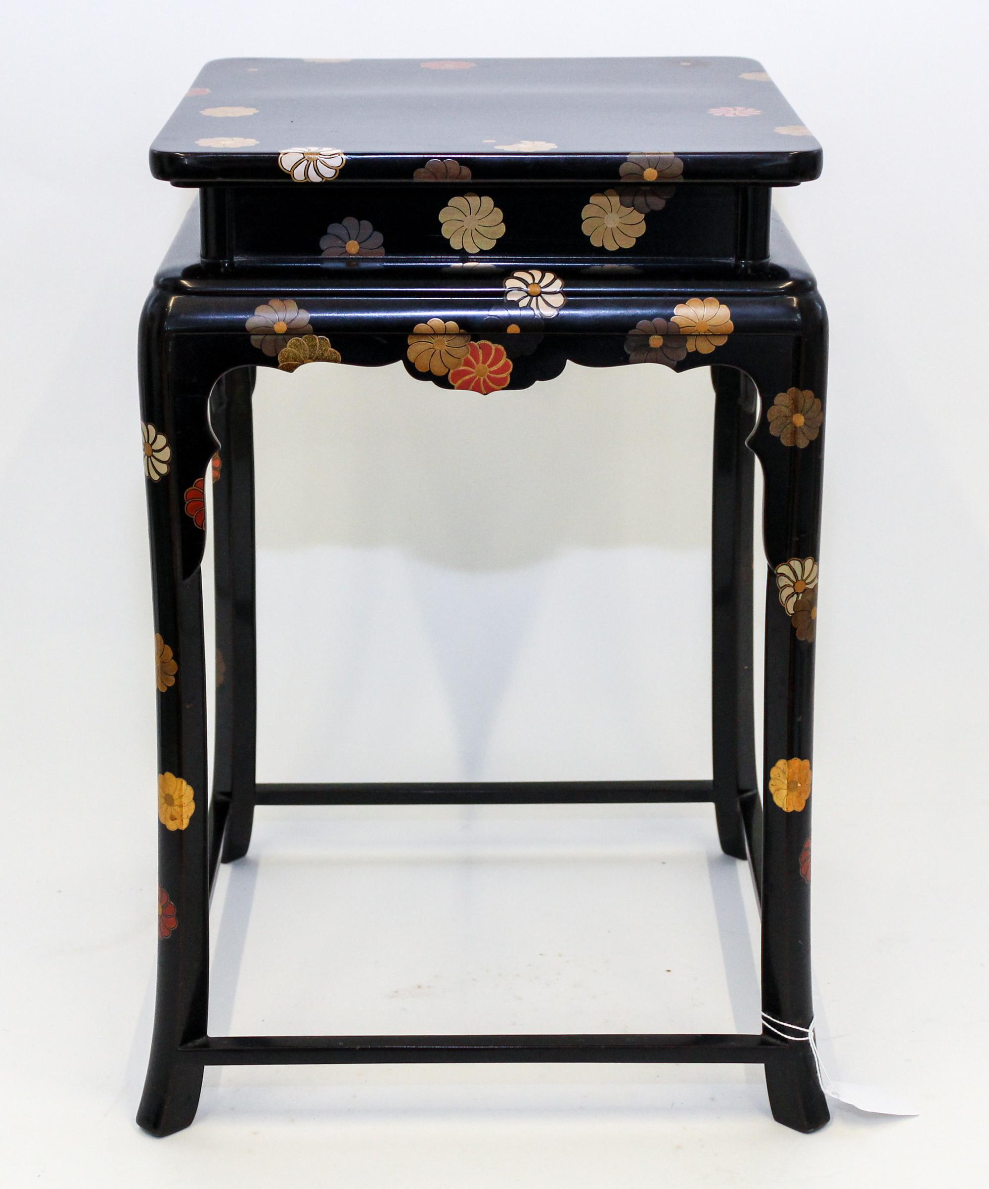 A Japanese Lacquered Stand Height 16 x width 10 1/4 x depth 10 1/4 inches.