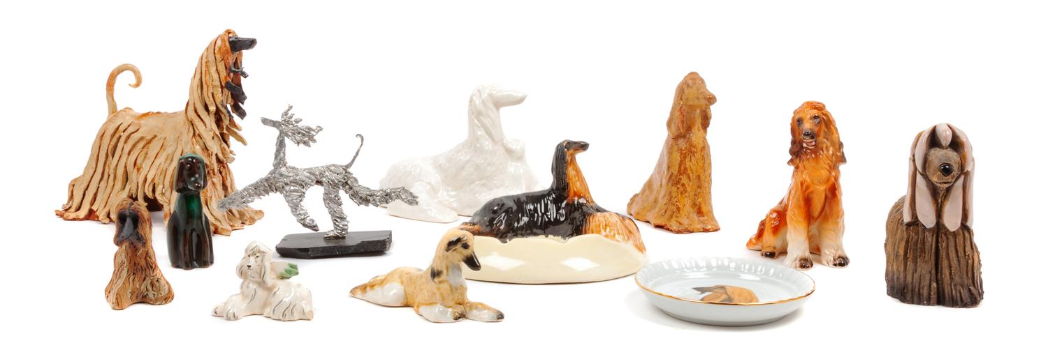A Group of Twelve Afghan Hound Porcelain and Ceramic Articles Height of tallest 6 inches.