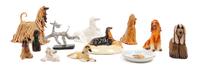 A Group of Twelve Afghan Hound Porcelain and Ceramic Articles Height of tallest 6 inches.