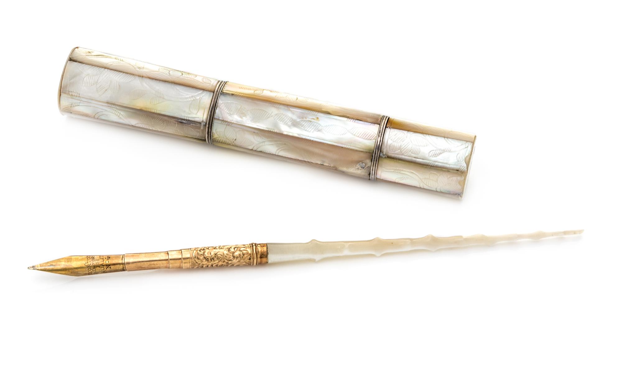 A Mother-of-Pearl Etui, , the paneled cylindrical body having lids at the poles enclosing a thimble case and a compartment for needles,