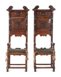A Pair of Renaissance Revival Carved Walnut Hall Chairs