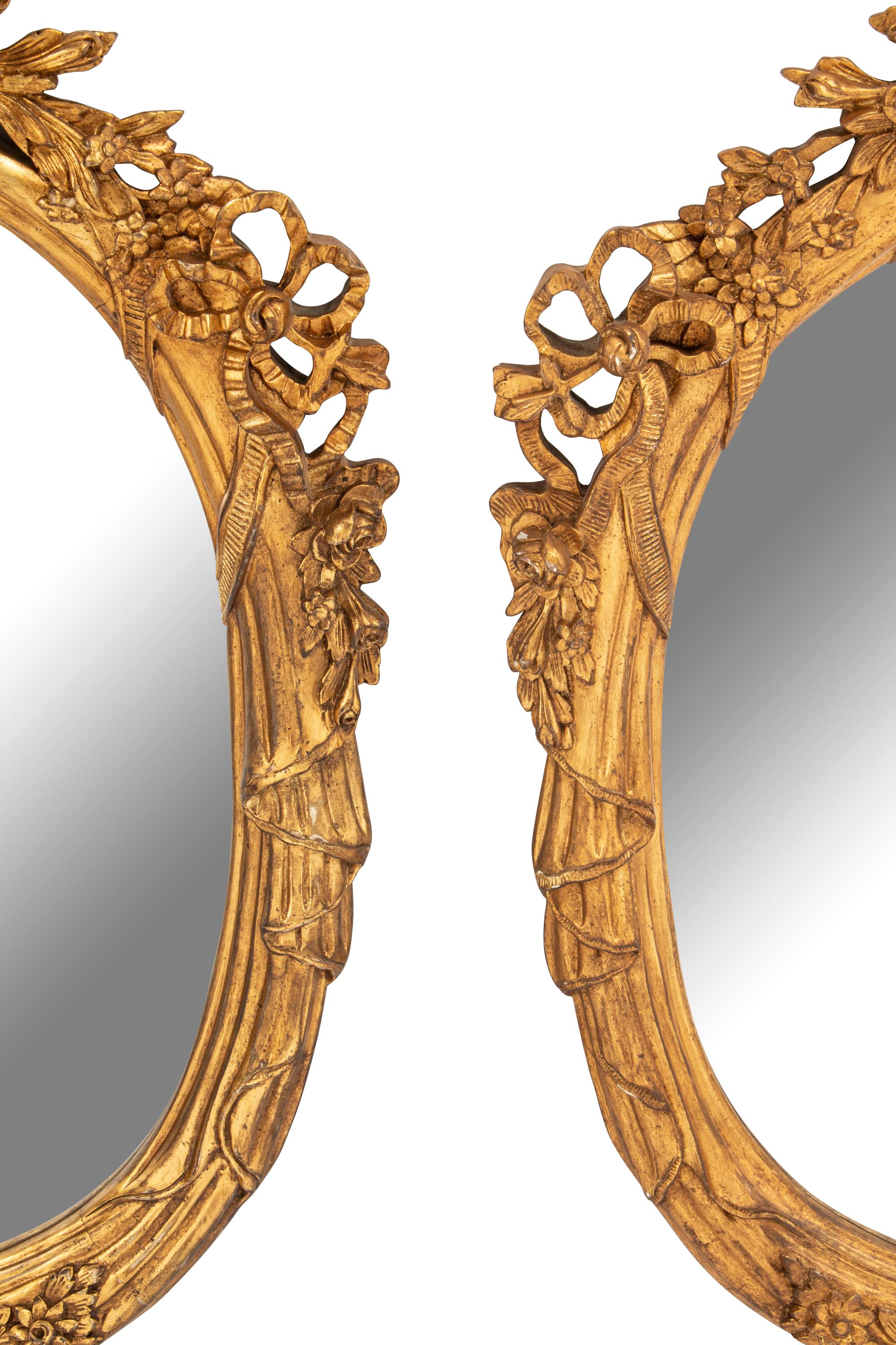 A Pair of Louis XV Style Giltwood Mirrors