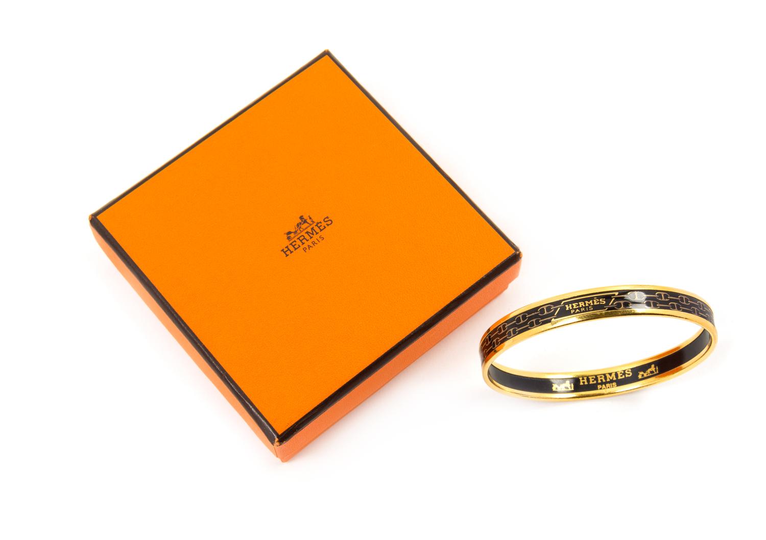 An Hermès Black Enamel Narrow Bangle, 2.5" diameter.