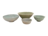 A Collection of Four Chinese and Korean Celadon Porcelain Bowls