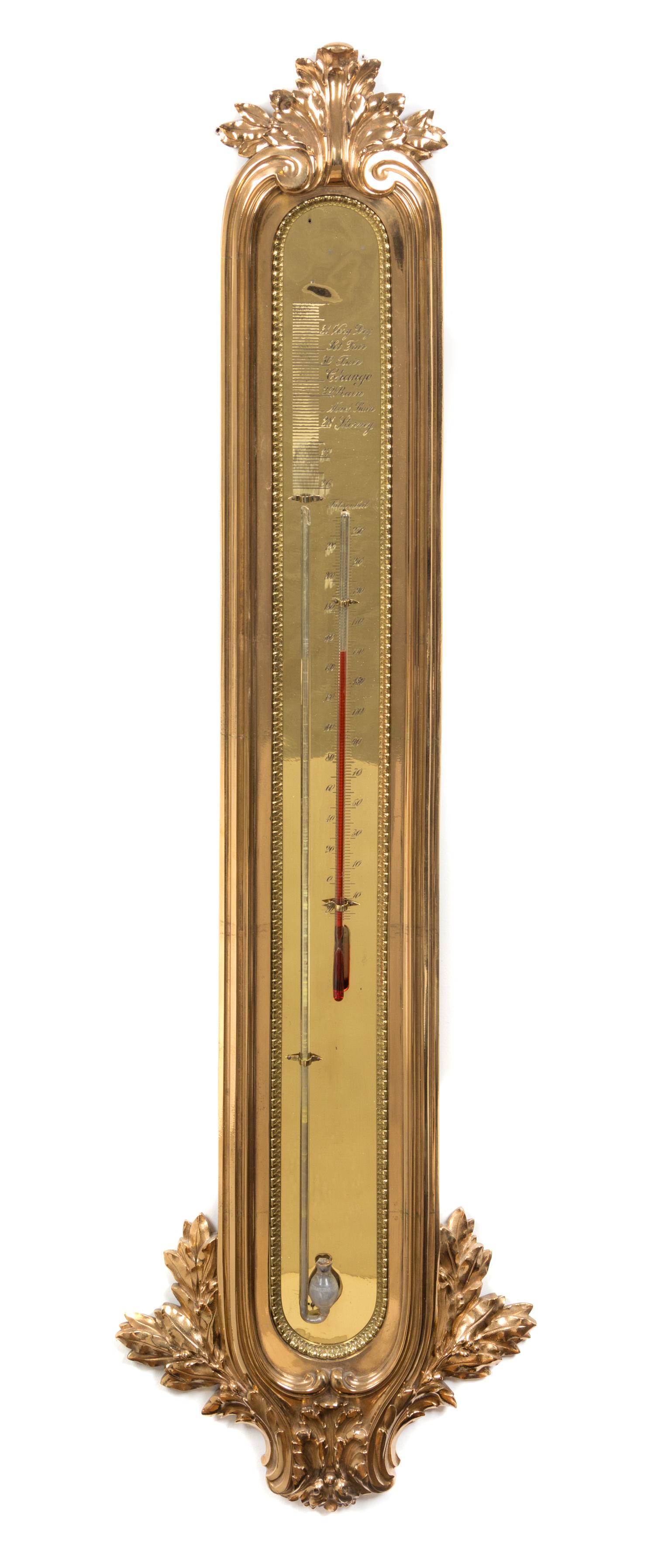 A Neoclassical Style Brass Barometer Height 48 x width 13 1/2 inches.