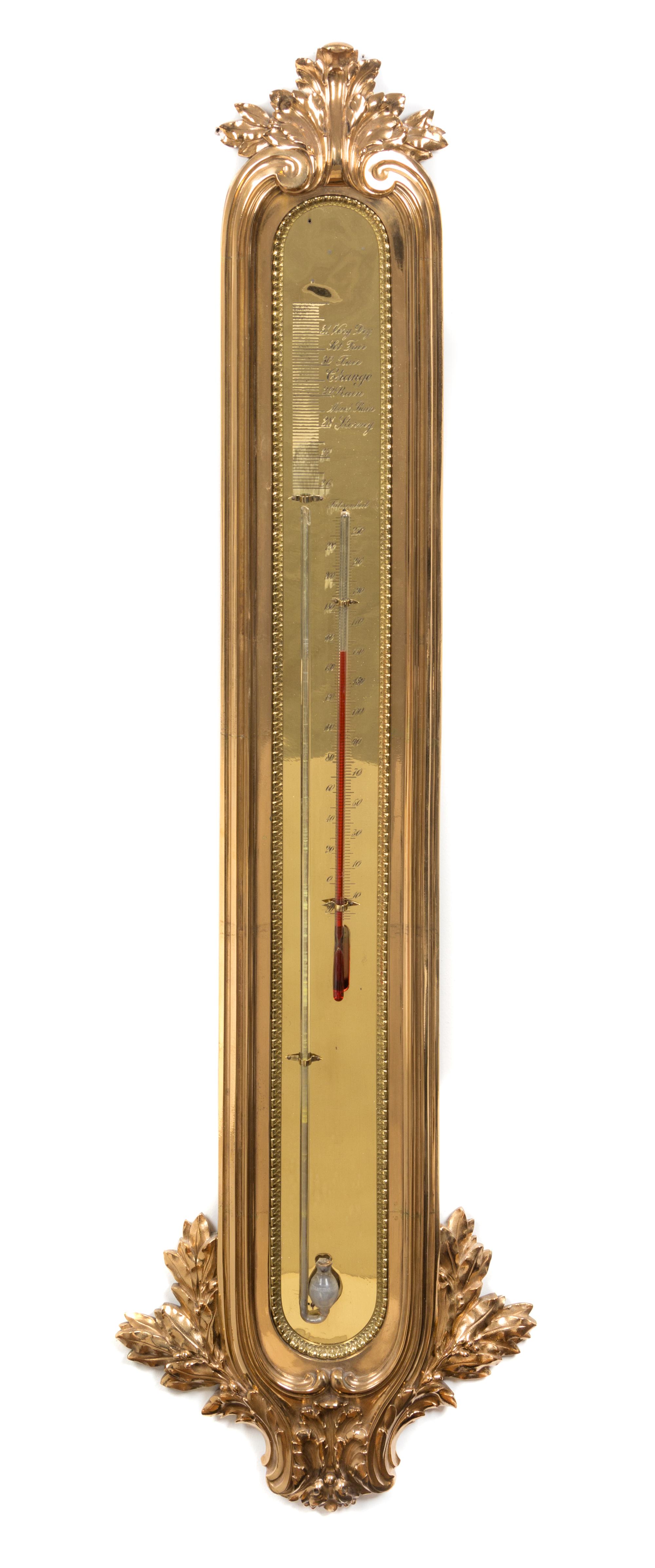 A Neoclassical Style Brass Barometer Height 48 x width 13 1/2 inches.