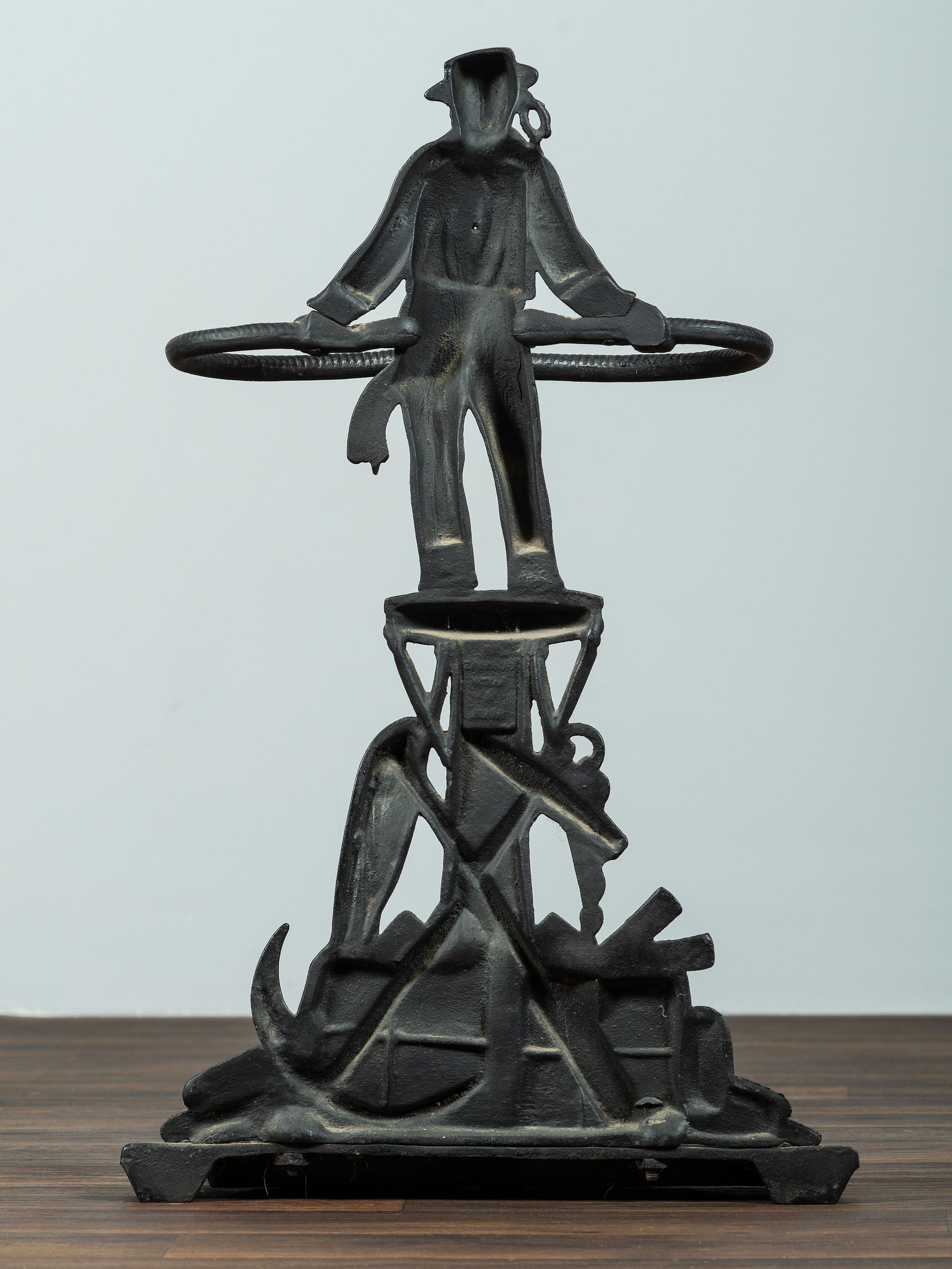 A Cast Iron Sailor Umbrella Stand