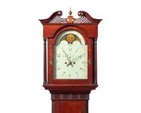 A Federal Carved And Inlaid Walnut and Cherrywood Tall Case Clock