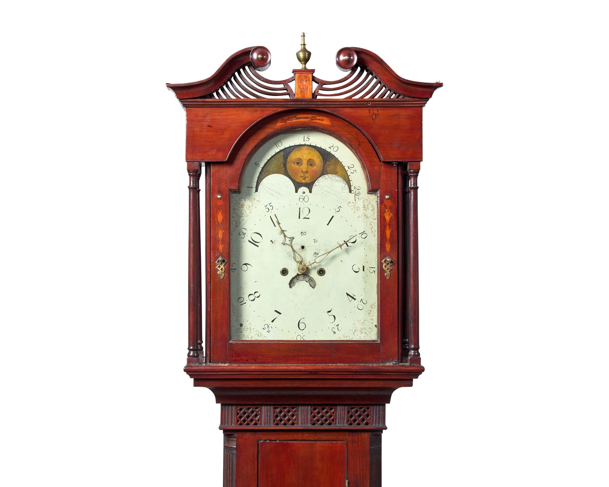 A Federal Carved And Inlaid Walnut and Cherrywood Tall Case Clock
