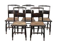 A Set of Eight Lacquered and Gilt Decorated Hitchcock Side Chairs Height 35 inches