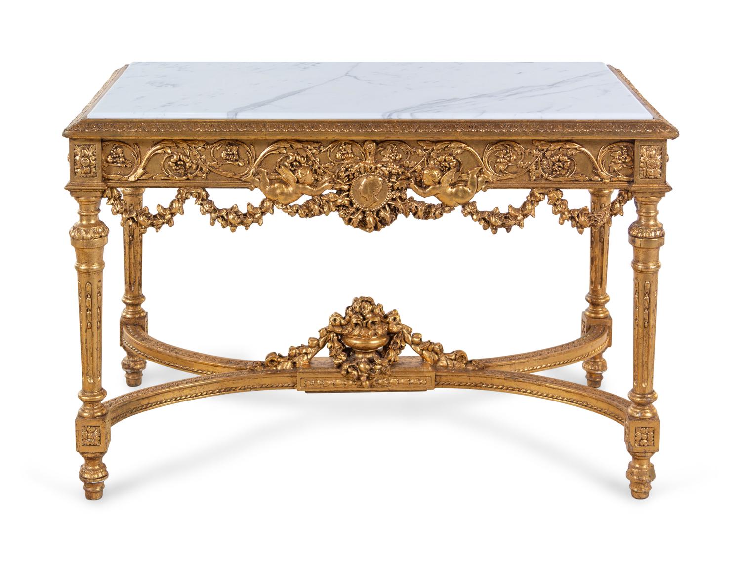 A Louis XVI Style Carved Giltwood Marble-Top Center Table