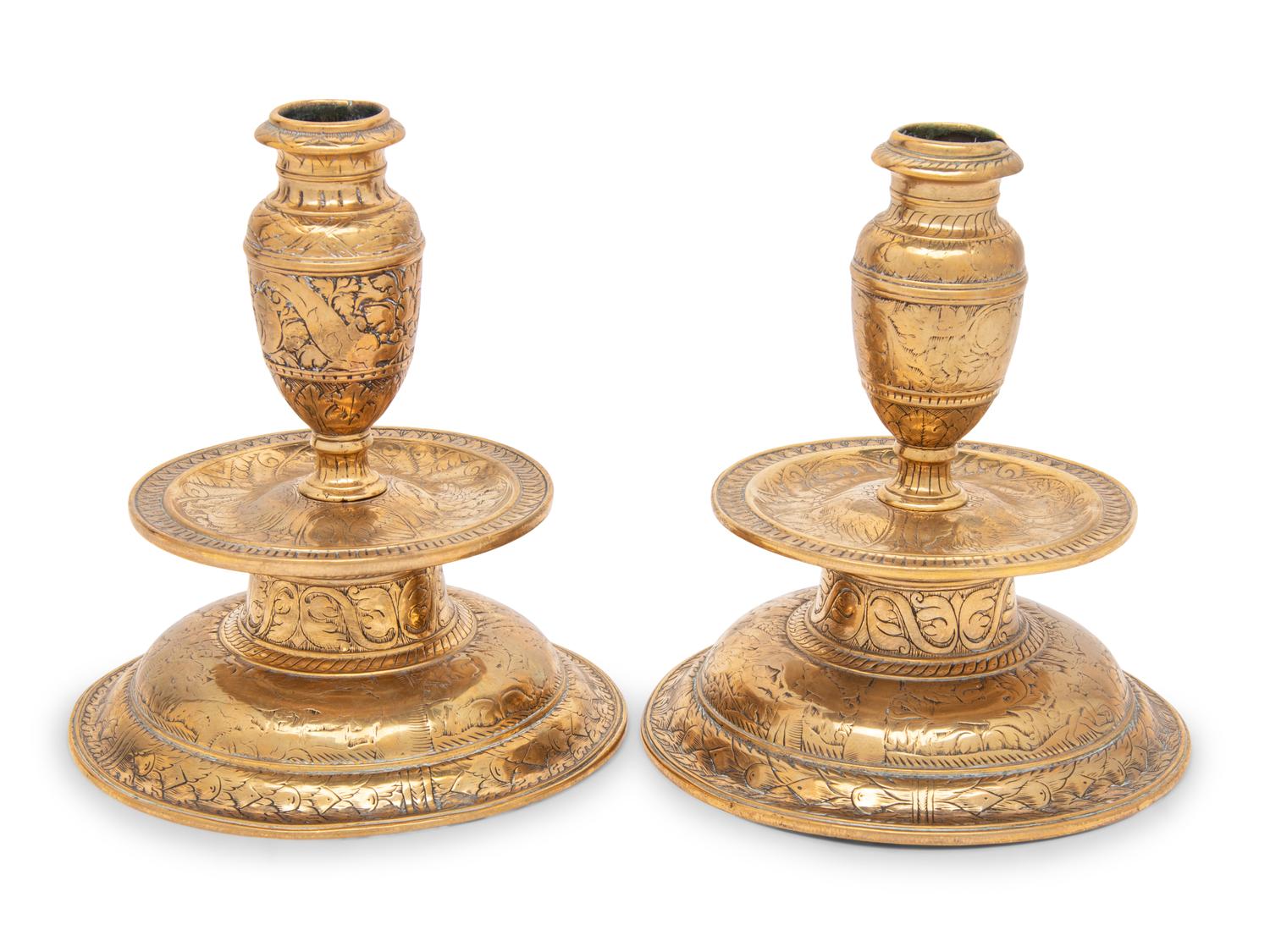 A Pair of Venetian Gilt Bronze Candlesticks