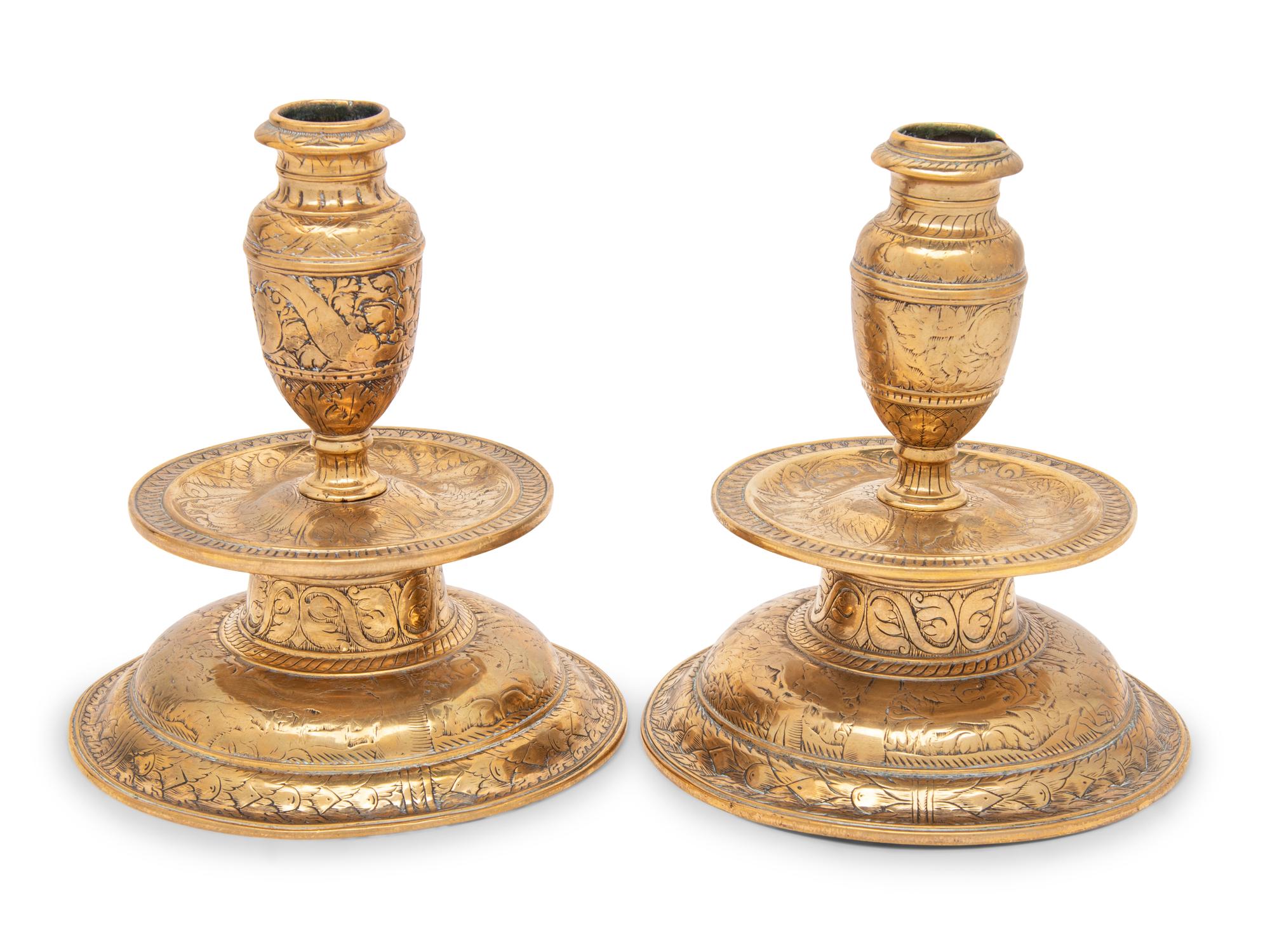 A Pair of Venetian Gilt Bronze Candlesticks