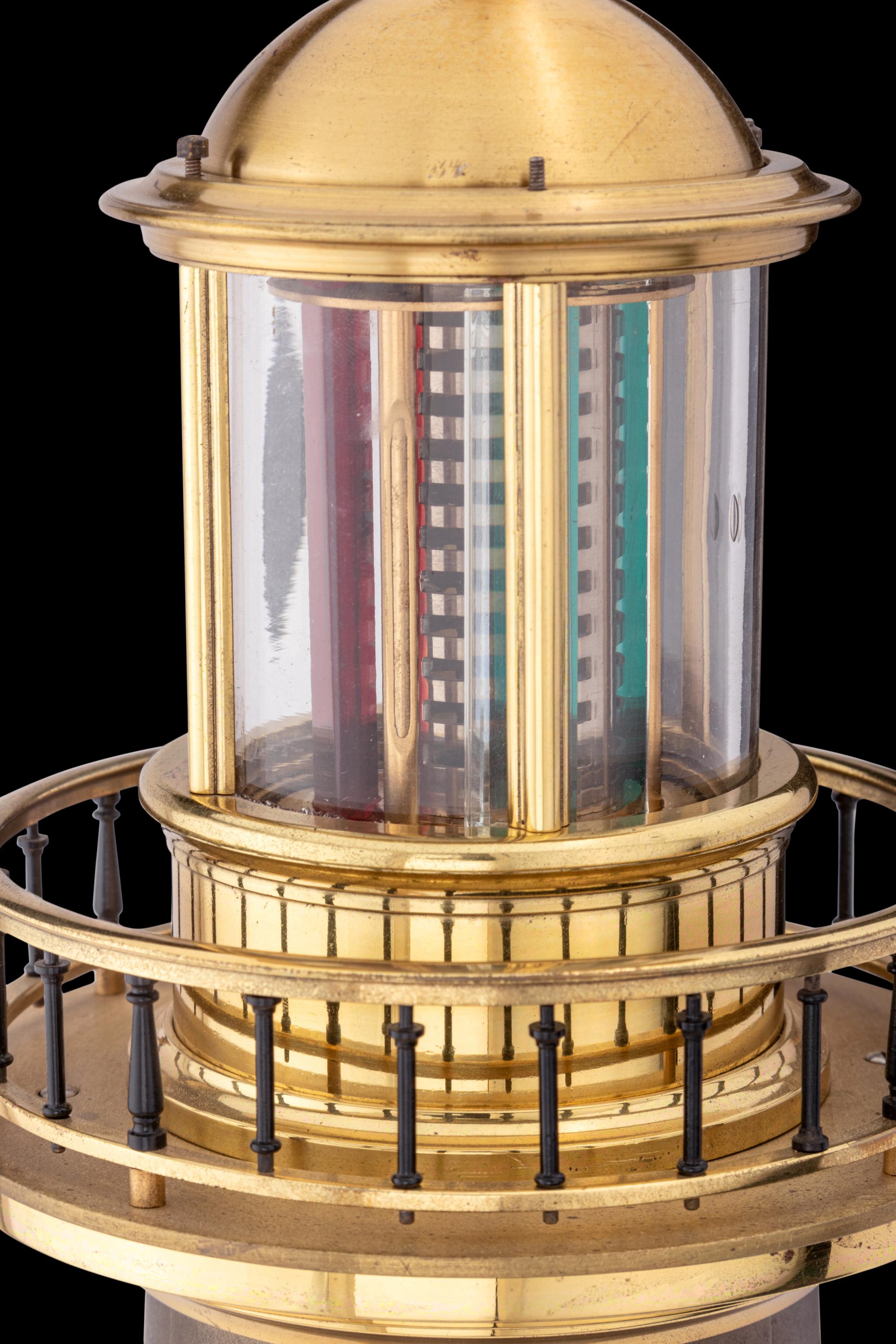 A Patinated and Gilt Bronze Lighthouse Clock