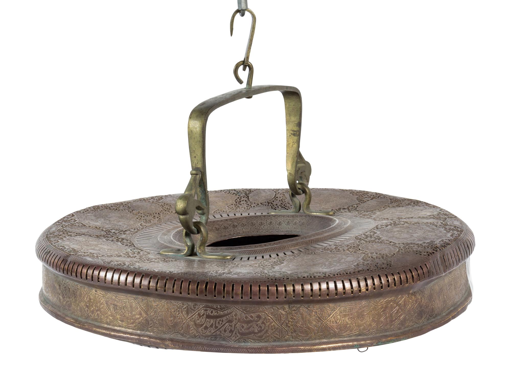 A Qajar Brass Hanging Accordion Candle Lamp