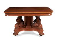 An American Renaissance Revival Carved Oak Extension Dining Table
