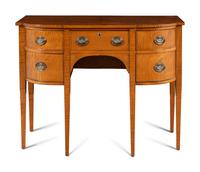 A Federal Style Tiger Maple Bowfront Sideboard