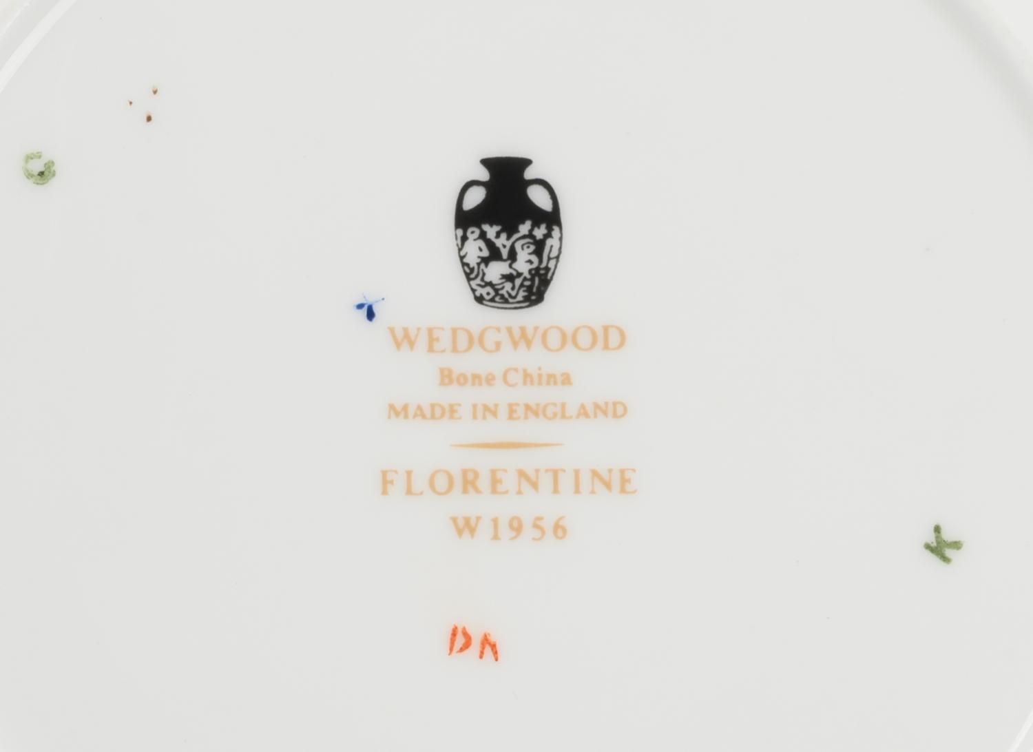 A Wedgwood Florentine Porcelain Partial Dinner Service