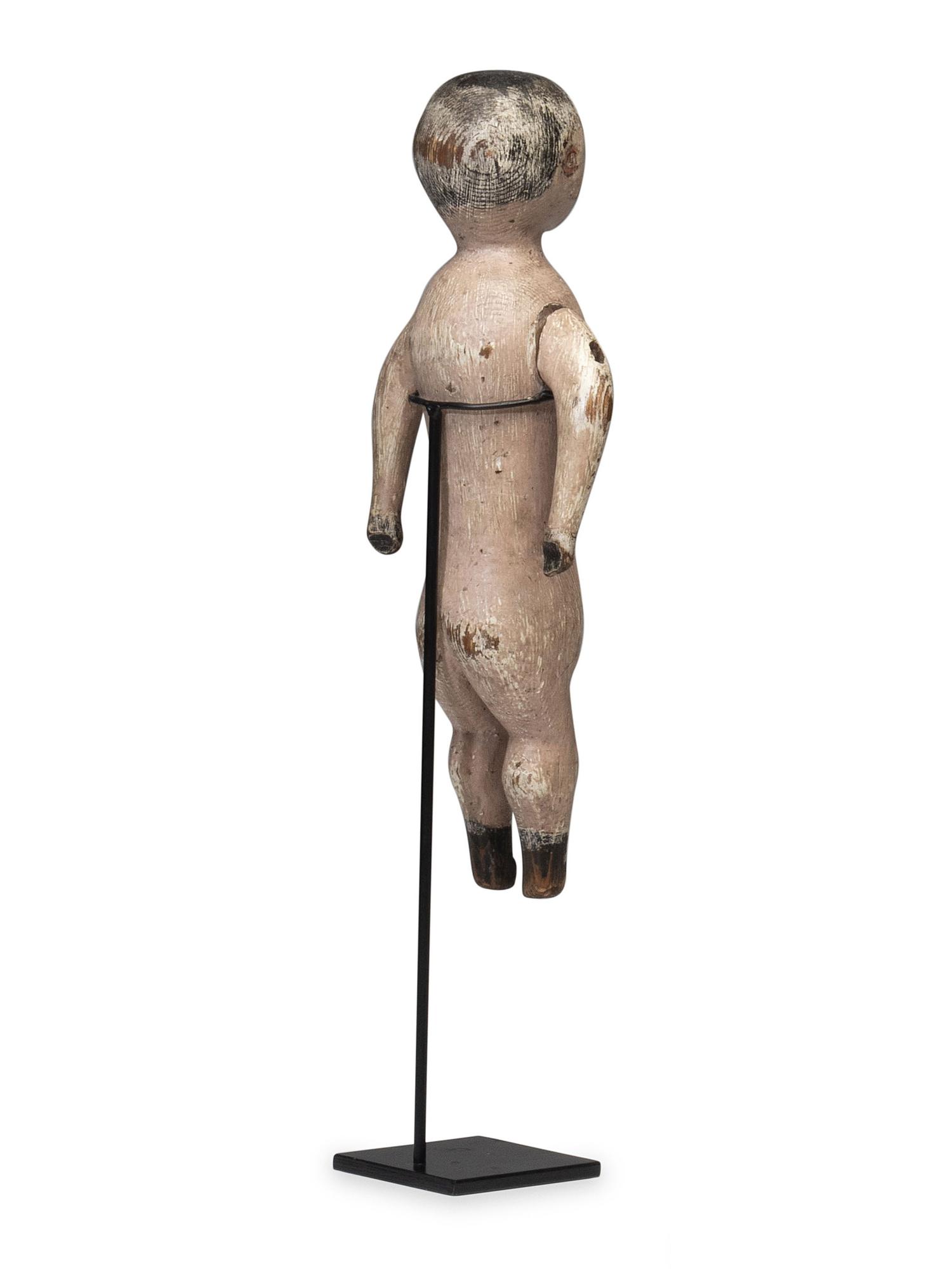 A Carved and Painted Wood Whirligig