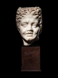 A Roman Marble Satyr Head
