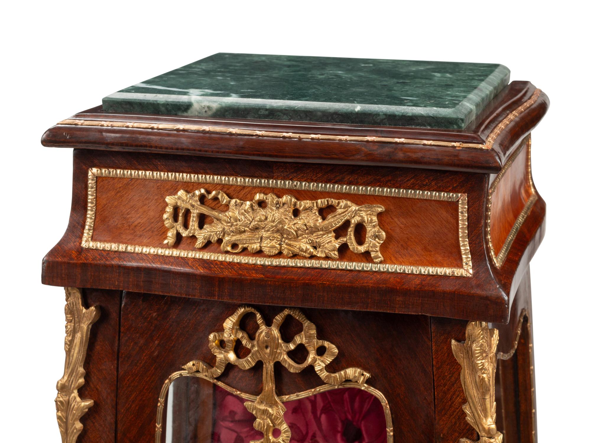A Pair of Louis XV Style Gilt Metal Mounted Marble-Top Vitrine Cabinets