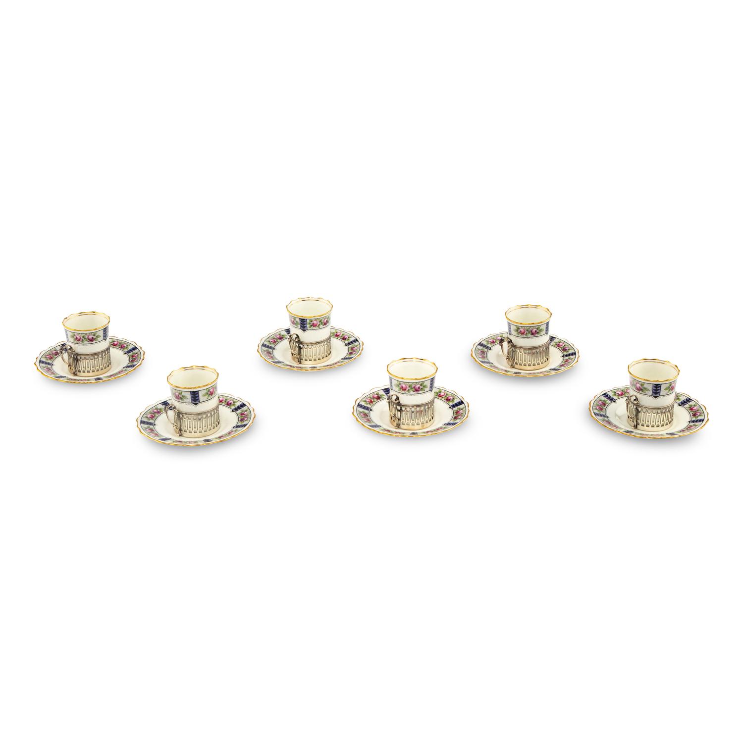 A Set of Six Aynsley Porcelain Coffee Cups and Saucers with Silver Liners
