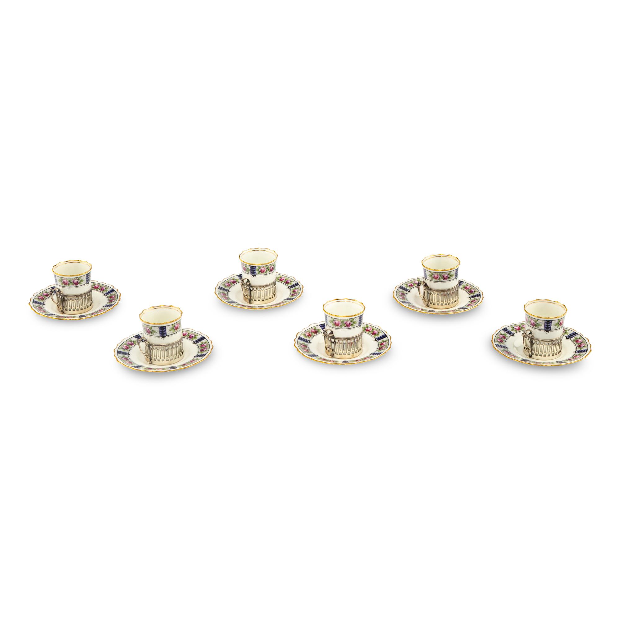 A Set of Six Aynsley Porcelain Coffee Cups and Saucers with Silver Liners